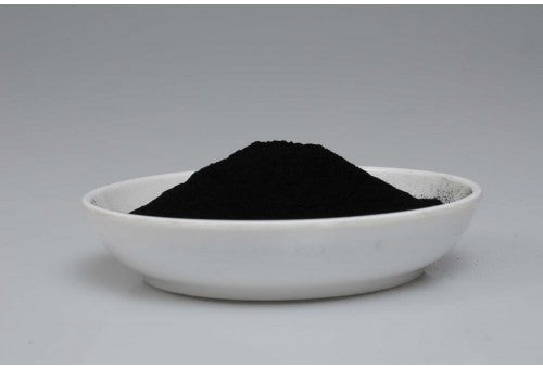 XT catalyst powder in a white dish